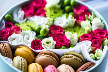 Fototapeta na wymiar Flower box with macarons, Good idea for friendly gift