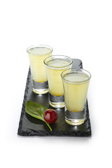Strong Alcohol Shot Set in Three Small Glasses Isolated