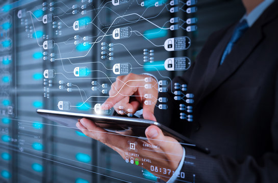 businessman  using tablet computer and server room background