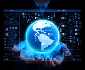 holding a glowing earth globe in his hands