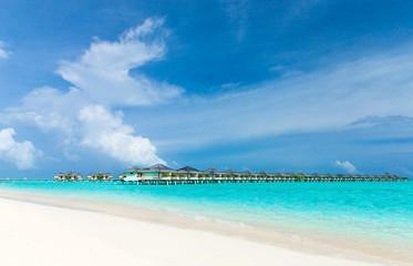 Fototapeta premium Maldives island with white sandy beach and sea