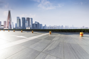 Panoramic skyline and modern business office buildings with empty road,empty concrete square floor