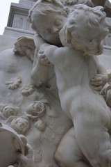 Fototapeta premium details on Mozart statue in Vienna city with baby angels and instruments