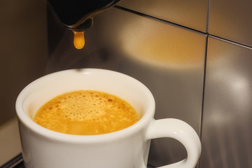 black coffee poured into a Cup