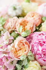 Close-up beautiful spring bouquet. flower arrangement with hydrangea and peonies. Color light pink. The concept of a flower shop, a small family business