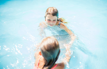 Dancing in pool.