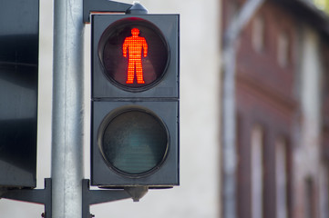 Red pedestrian traffic light black - 215930144