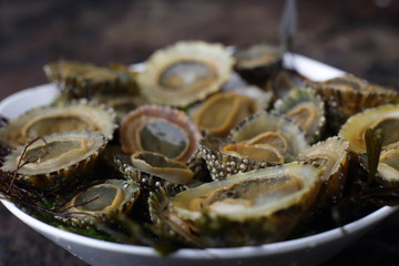 Plate with fresh limpets