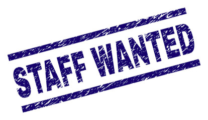 STAFF WANTED seal print with distress style. Blue vector rubber print of STAFF WANTED text with unclean texture. Text title is placed between parallel lines.