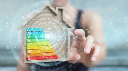 Businesswoman using 3D rendering energy rating chart in a wooden house