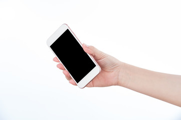 Concept of woman's hand holding a smartphone isolated on white background, clipping path, blank for webpage or message.