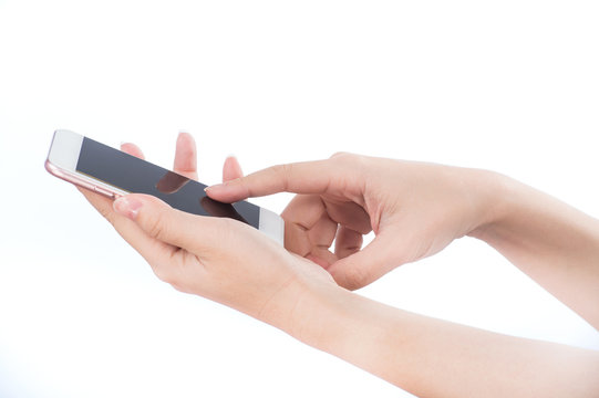 Concept of woman's hand holding a smartphone and pointing with figer isolated on white background, clipping path, blank for webpage or message.