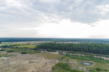 Naklejka premium Luftaufnahme Kiesabbau aus der Luft in einer Kiesgrube