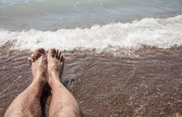 People standing on the beach.
