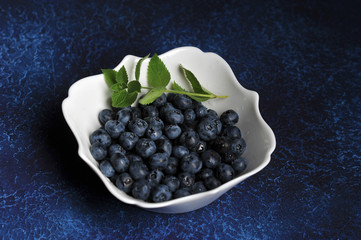 Fresh ripe blueberries with mint