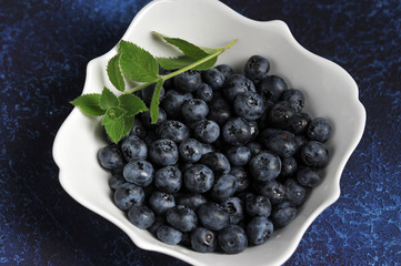 Fresh ripe blueberries with mint