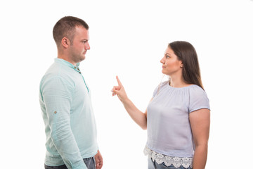 Side view of young couple arguing