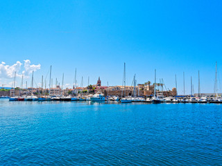 View of the city of Alghero. Shot from the sea. Sardinia, Italy.