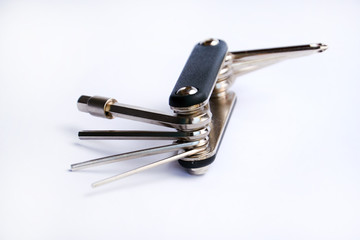 Used multi-tool for bicycle isolated on a white background