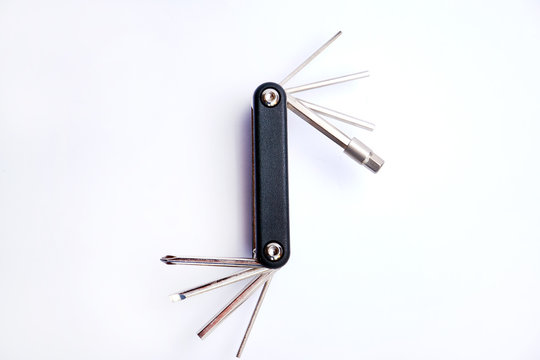 Used multi-tool for bicycle isolated on a white background