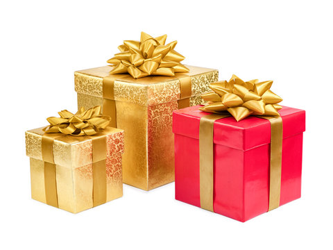 Gold and red gift boxes on white background