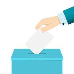 Business hand putting a ballot in a ballot box