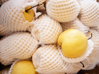 chinese pear type of tropical fresh fruits , heap of organic nutrition diet fruit at asian market in Thailand . common useful vitamin for good foods .