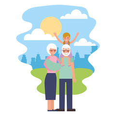 cute grandparents with grandchildren in landscape