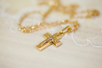 Christian cross to wear on the body after baptism.