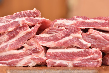 Beautiful and fresh pork meat on a cutting board. Pork ribs for a delicious dinner. Close-up