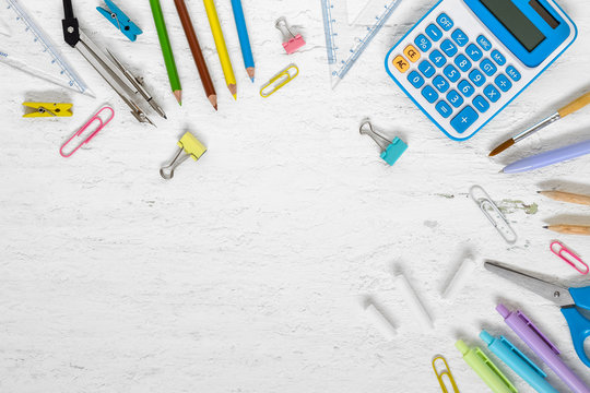 Top View Back To School Concept And Education Background Concept. School Supplies, Stationery Accessories On Grunge White Wood Background. Flat Lay, Top View