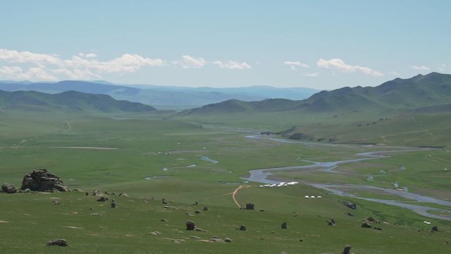 Orkhon river Mongolia with hills in the background.