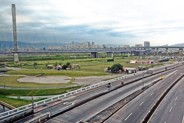 landscape of city with lots of buildings with road on the background