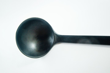 black plastic spoon
