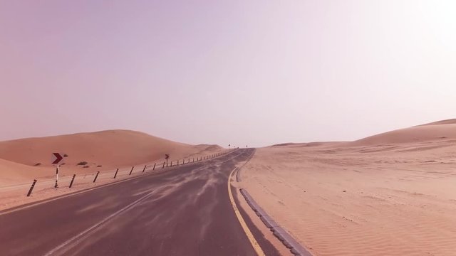 New road from Oasis Liwa to Moreeb Dune in Rub al Khali desert stock footage video