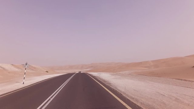New road from Oasis Liwa to Moreeb Dune in Rub al Khali desert stock footage video