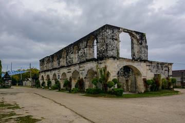 Fototapeta na wymiar Ruins of the old Catholic church of the Spanish era on the island of Cebu -Our Lady of Immaculate Concepcion Church. Oslob City, Cebu Philippines
