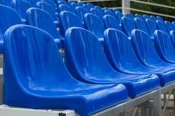 Fototapeta premium Blue empty seats in an open air amphitheater