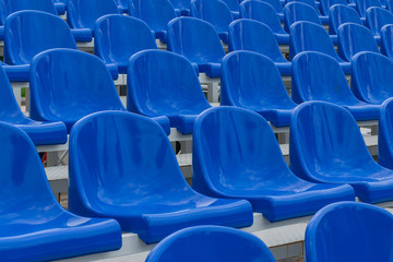 Blue empty seats in an open air  amphitheater