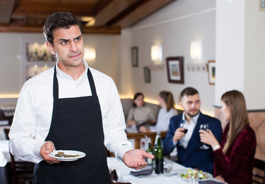 Waiter dissatisfied with small tip