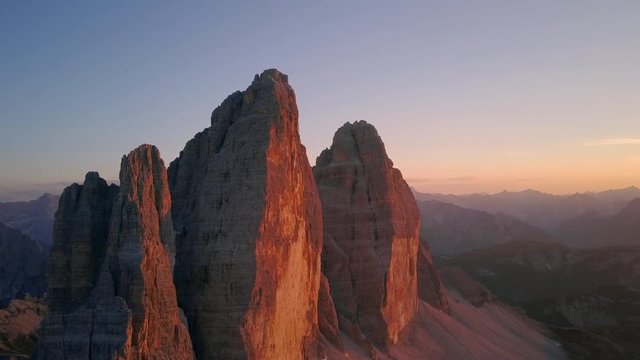 tre cime di lavaredo dolomites famous mountain drone aerial shot at sunset