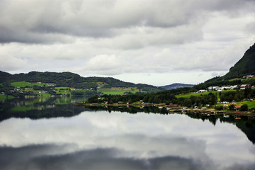 Fototapeta na wymiar Lake and village in the county of More og Romsdal, Norway