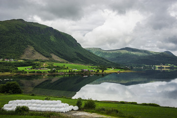 Fototapeta na wymiar Lake and village in the county of More og Romsdal, Norway