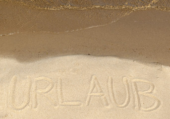 Botschaft im Sand - Urlaub