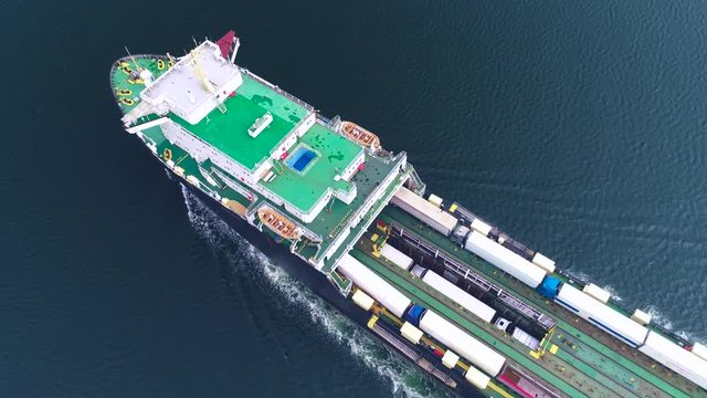 Aerial drone view of container cargo ship, import export business logistic and transportation of International by ship in the open sea