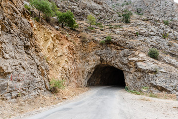 Obraz premium View of dark old long tunnel used to to go Town of Kemaliye