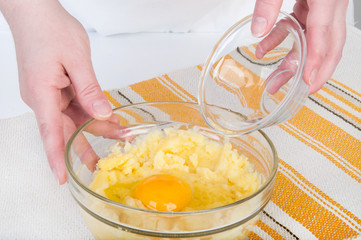 Glass bowls with boiled potatoes and egg.