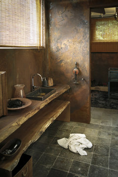 Modern bathroom with corten steel wall cladding