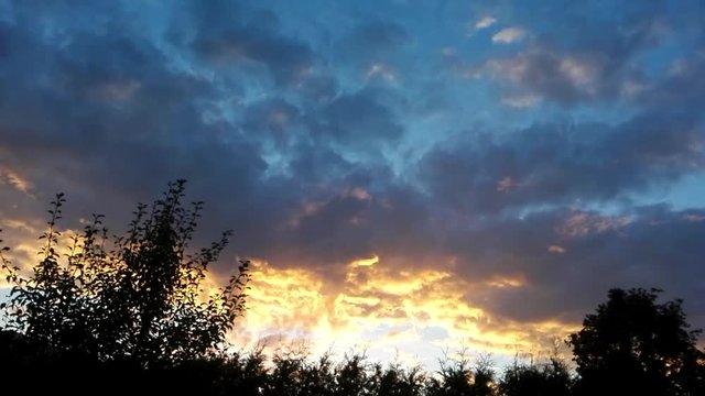 Timelapse of colored clouds and sunset