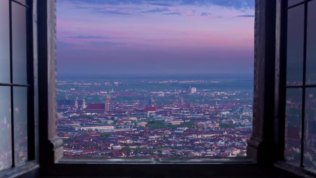 munich skyline aerial view seen through window timelapse day to night